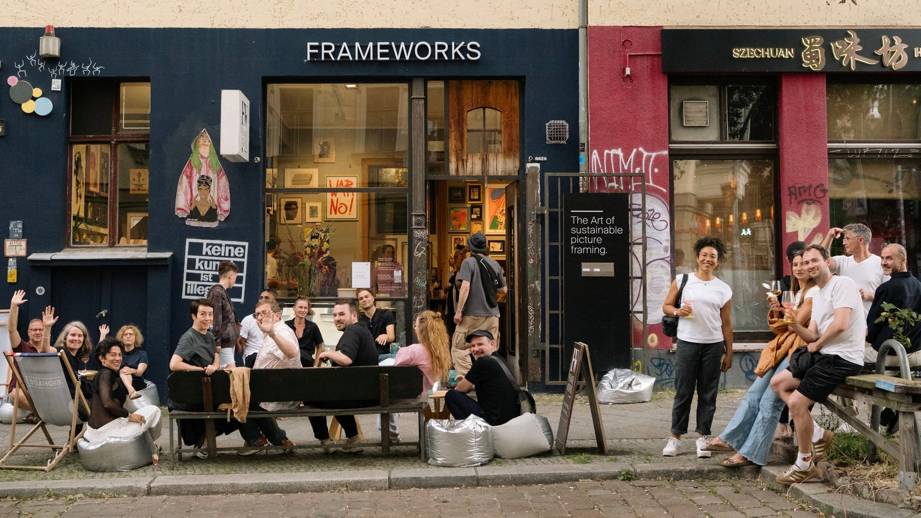 Frameworks 12 year celebration with everyone outside store