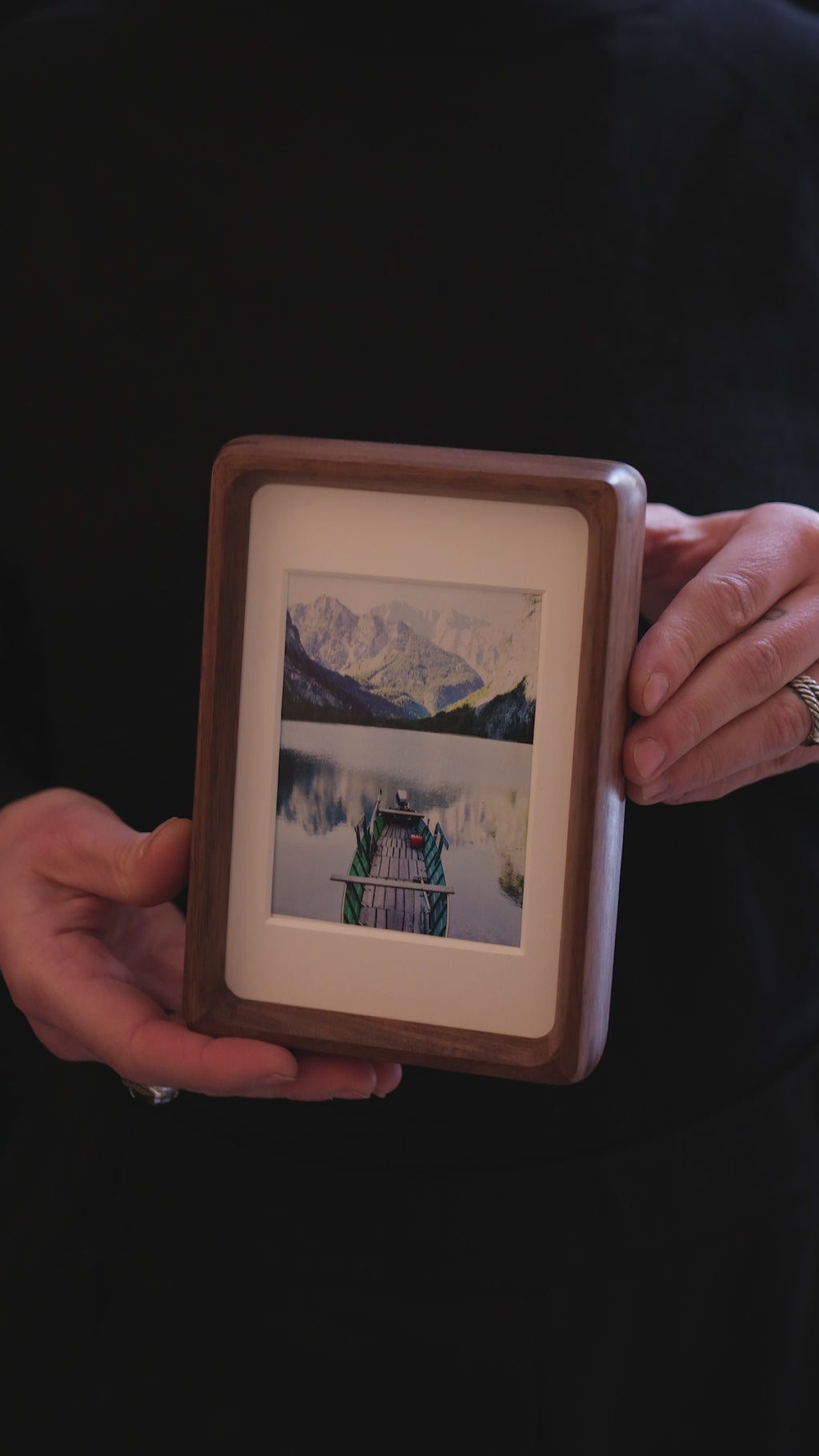 looking at the details of the walnut frame